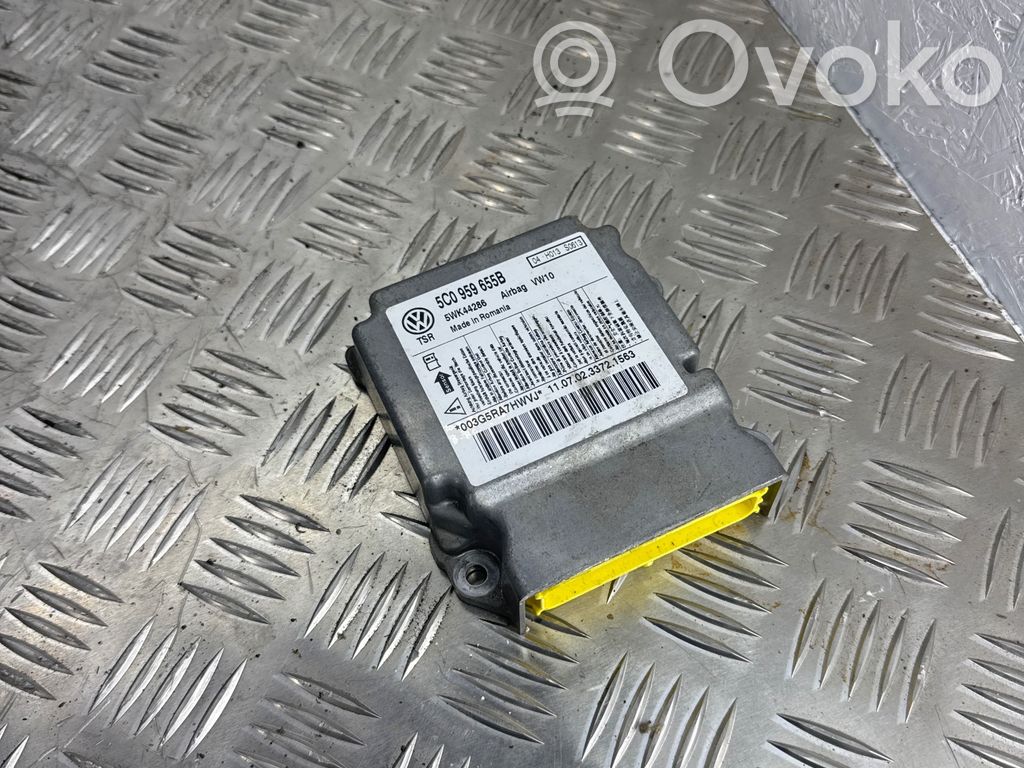 Volkswagen Golf VI Airbag control unit/module 